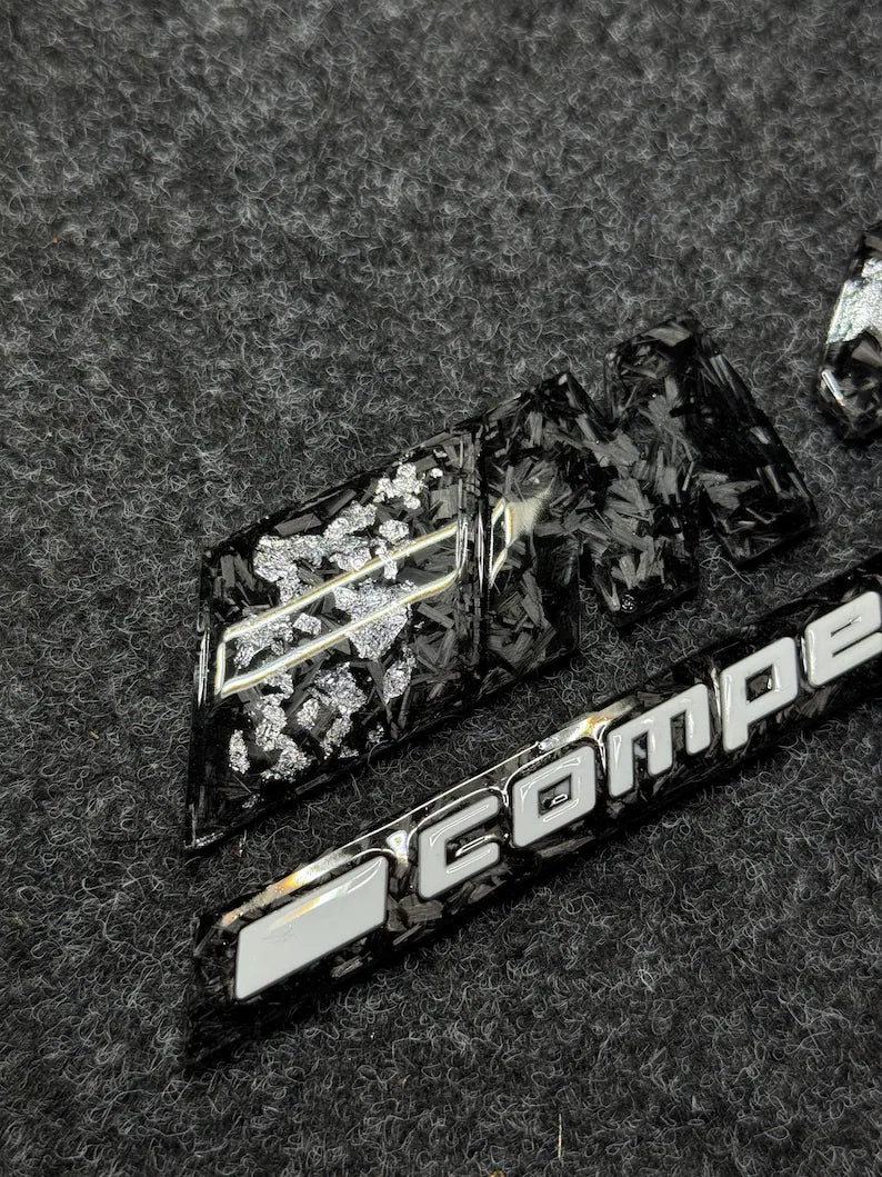 badge m4 competition silver carbon forged