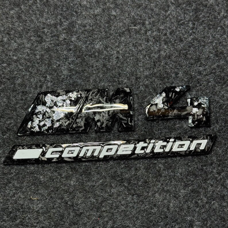 badge m4 competition silver carbon forged