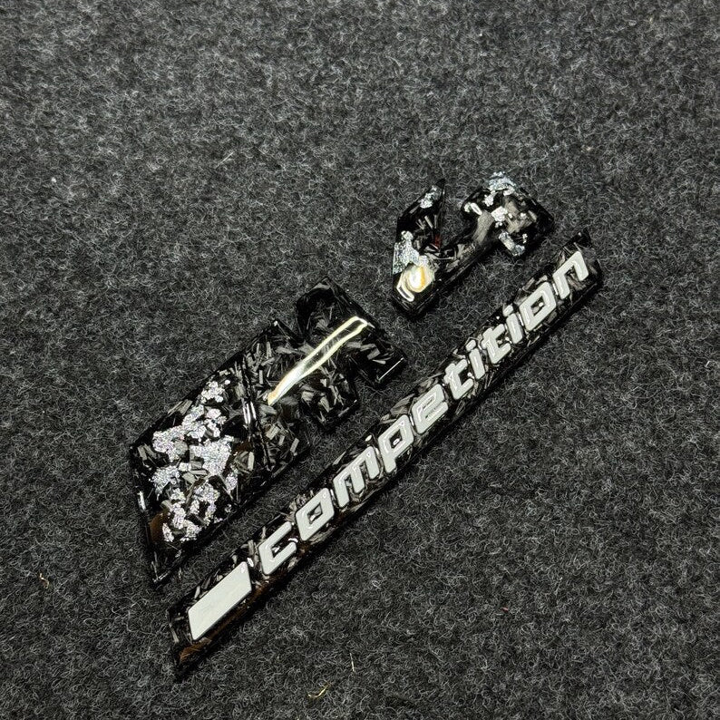 badge m4 competition silver carbon forged